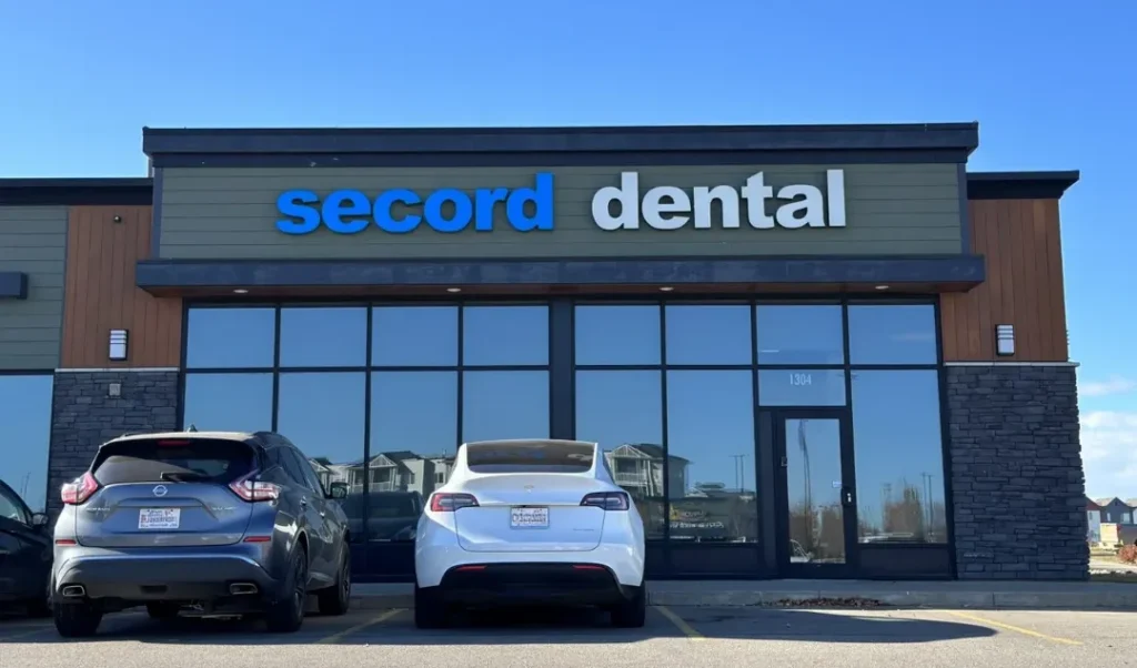 Dr. Usman Mohammad - 1 - Smiles Dental Group secord smiles front